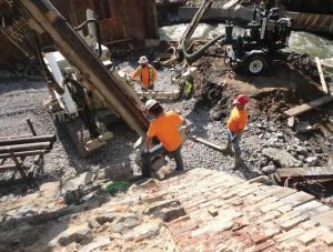 Burgess & Niple designed the bridge with micropiles instead of hammer-driven piles to reduce vibrations adjacent to the existing stone masonry.