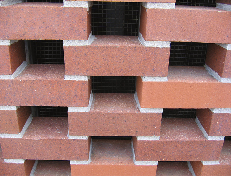 Clay bricks for exterior walls of a building structure
